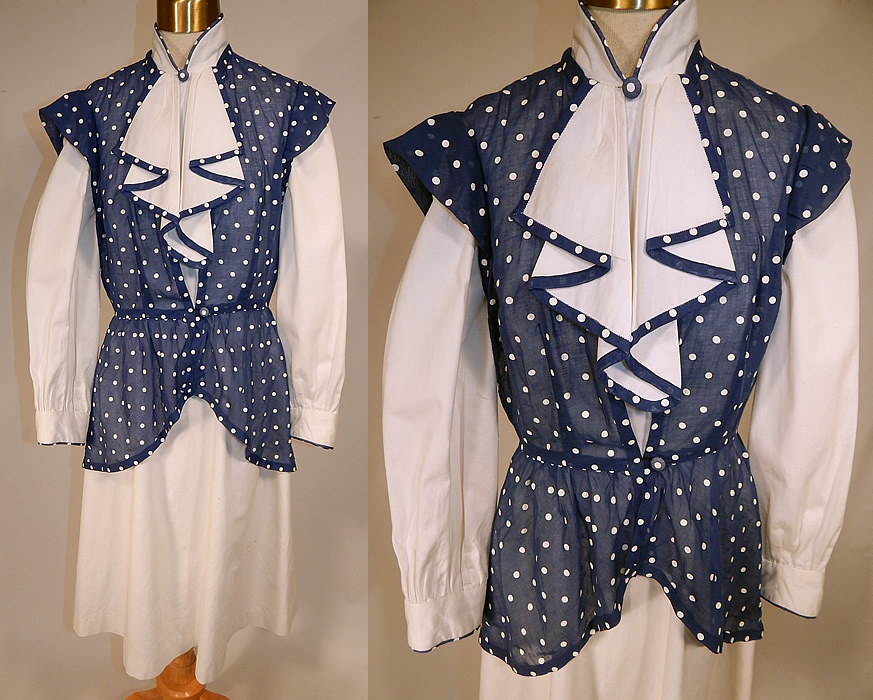 Vintage Navy Blue & White Cotton Polka Dot Dress Jabot Peplum Jacket Top
This vintage navy blue and white cotton polka dot dress, jabot, peplum jacket top dates from the 1940s. It is made of a crisp white cotton fabric dress, with a sheer navy blue and white polka dot cotton batiste fabric top. This stylish sophisticated two piece outfit includes a white dress with navy blue polka dot trim edging, a jabot ruffle trim front neckline, high neck collar, long full sleeves, button cuffs, a fitted waist, short mid length skirt and back zipper closure.