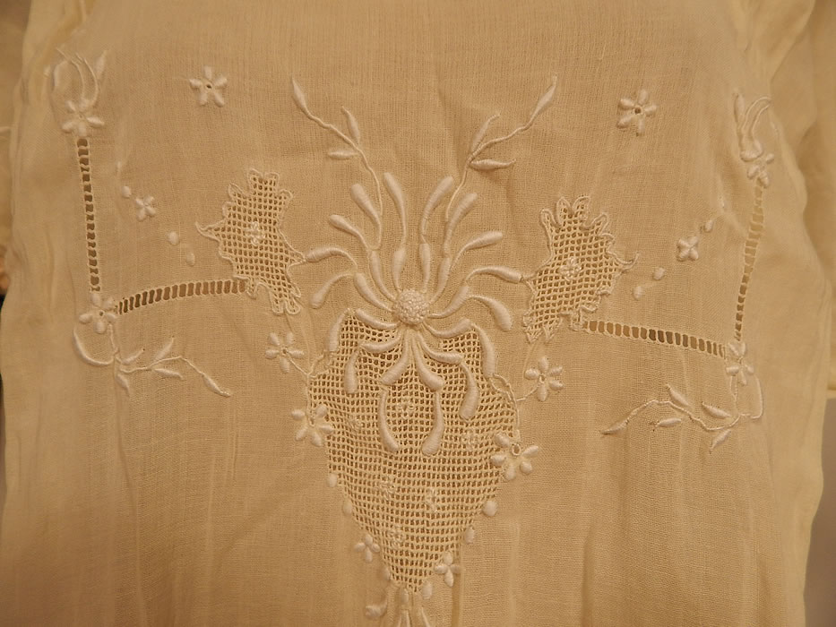 Vintage Boho Yellow Cotton Batiste Embroidered Drawn Cut Work Drop Waist Dress
This beautiful boho white work summer dress is loose fitting, with a drop waist, slight pleated gathering along the sides, short puffy sleeves and is sheer, unlined. 