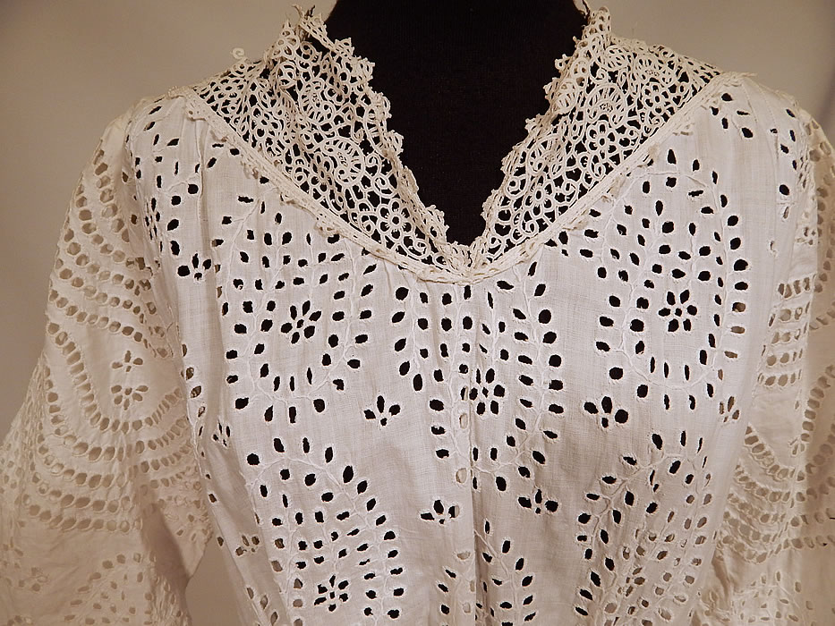 Victorian White Cotton Batiste Broderie Anglaise Eyelet Embroidery Cutwork Lace Dress
This lovely ladies lace lawn dress is a long floor length, with lace trim yoke collar neckline, 3/4 length sleeves, a fitted waistband, hook closures down the back and is sheer, unlined. 