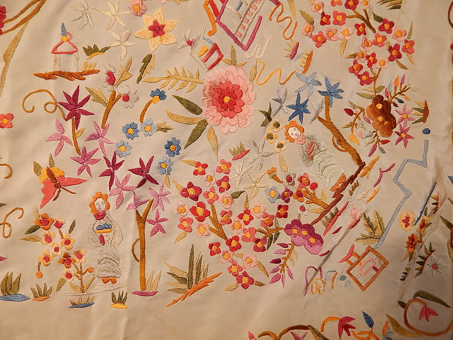 Antique Cream Silk Pastel Embroidered Figural Floral Chinese Canton Piano Shawl
There is a fabulous hand knotted macram&eacute; cream color silk fringe which measures 18 inches long surrounding the entire shawl with rounded corners. 