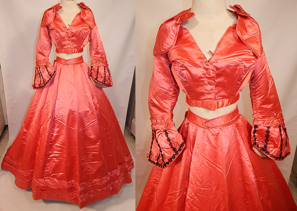 Victorian Magenta Pink Silk Ball Gown With Train Skirt 2 Bodices & Bow Belt
This antique Victorian era magenta pink silk ball gown with train, two bodices and bow belt dates from the late 1860s. 
