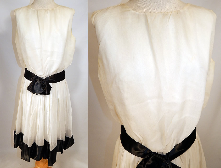 Vintage Mod Black & White Chiffon Belted A Line Sleeveless Cocktail Dress
This vintage mod black and white chiffon belted A line sleeveless cocktail dress dates from the 1960s. It is made of a sheer white chiffon fabric with black satin trim hemline and belted waist. 