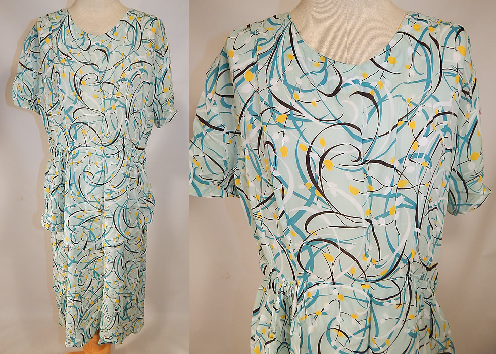 Vintage Teal Blue Floral Swirls Abstract Novelty Print Rayon Peplum Skirt Dress
This vintage teal blue floral swirls abstract novelty print rayon peplum skirt dress dates from the 1940s. It is made of a teal blue color rayon fabric with yellow, black and white floral, swirl abstract print pattern designs