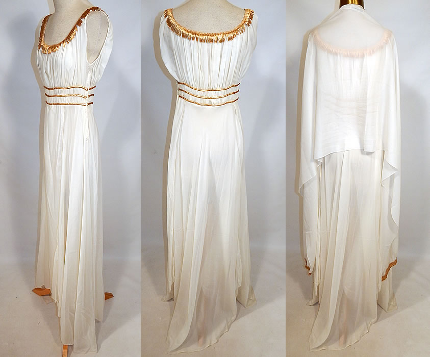 Vintage John Norman Lord & Taylor White Chiffon Grecian Goddess Gown
This gorgeous Grecian goddess gown is a long floor length, with a flowing wrap open slit skirt, slight back train, low rounded scoop necklines, a pleated sleeveless top, fitted waist, side zipper closure and is sheer, unlined. The dress measures 60 inches long, with a 24 inch waist and 34 inch bust. 