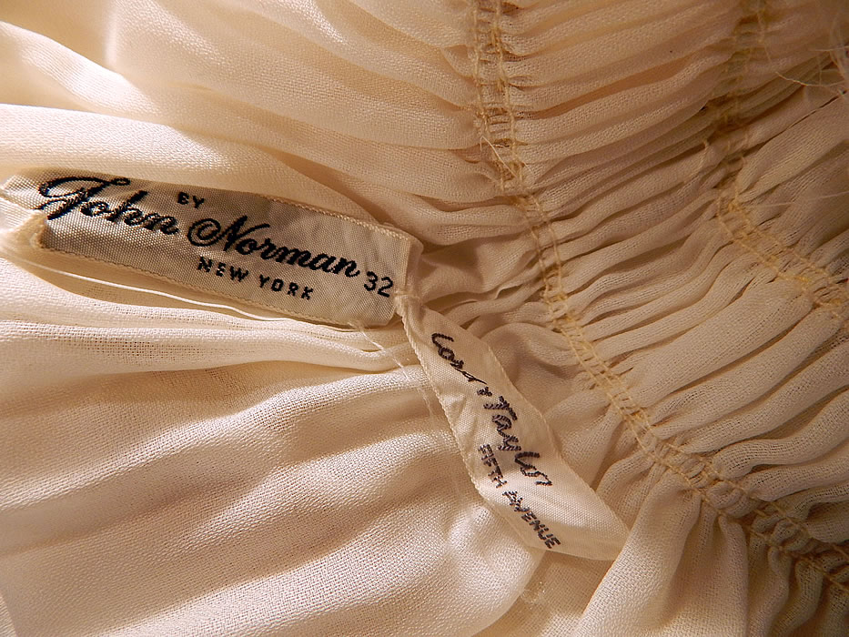 Vintage John Norman Lord & Taylor White Chiffon Grecian Goddess Gown
Both have a "By John Norman New York" lingerie designer label and "Lord & Taylor Fifth Avenue" store label, size 32 tag sewn inside. It is in excellent condition. This is truly a wonderful piece of high quality lingerie wearable art!
