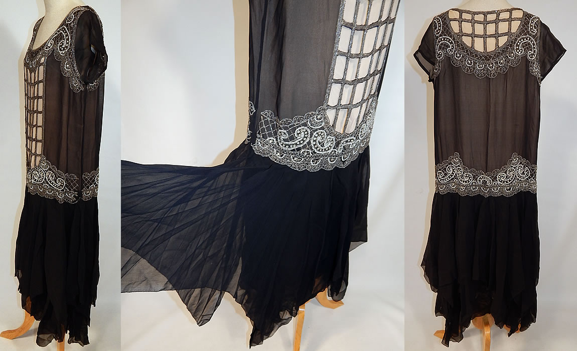 Vintage Art Deco Black Silk Chiffon Lattice Rhinestone Beaded Handkerchief Flapper Dress
This fabulous flapper dress has a loose fitting, drop waist style, with a beaded yoke rounded neckline, lattice front panel top backed in a nude silk fabric, short cap sleeves, an uneven handkerchief hemline skirt and is fully lined. 