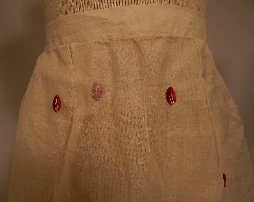 Victorian White Cotton Organdy Fabric Red Berry Polka Dot Embroidered Skirt
This stunning summer skirt is a long floor length, with a ruffle bottom hem, fitted waistband, back pleated gathering, a mother of pearl button closure on the back and is sheer, unlined. 