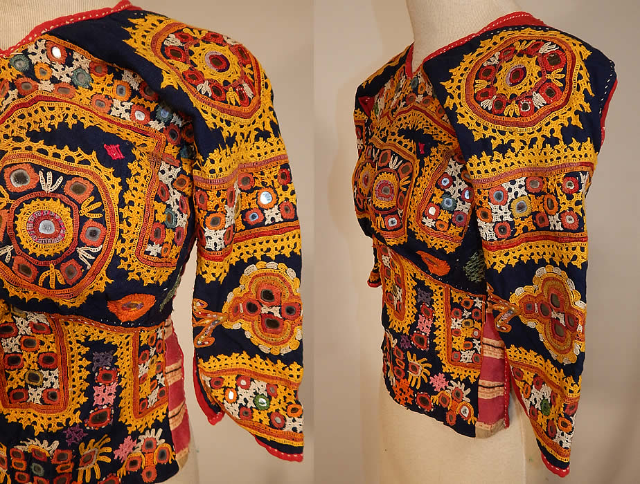 Vintage Antique Indian Gujarati Kutch Work Embroidered Mirror Choli Boho Blouse Top
This stunning traditional handmade hand embroidered fitted, short cropped choli boho blouse top has an open back with two adjustable back tie strap closures and is fully lined in a red cotton floral print fabric inside.