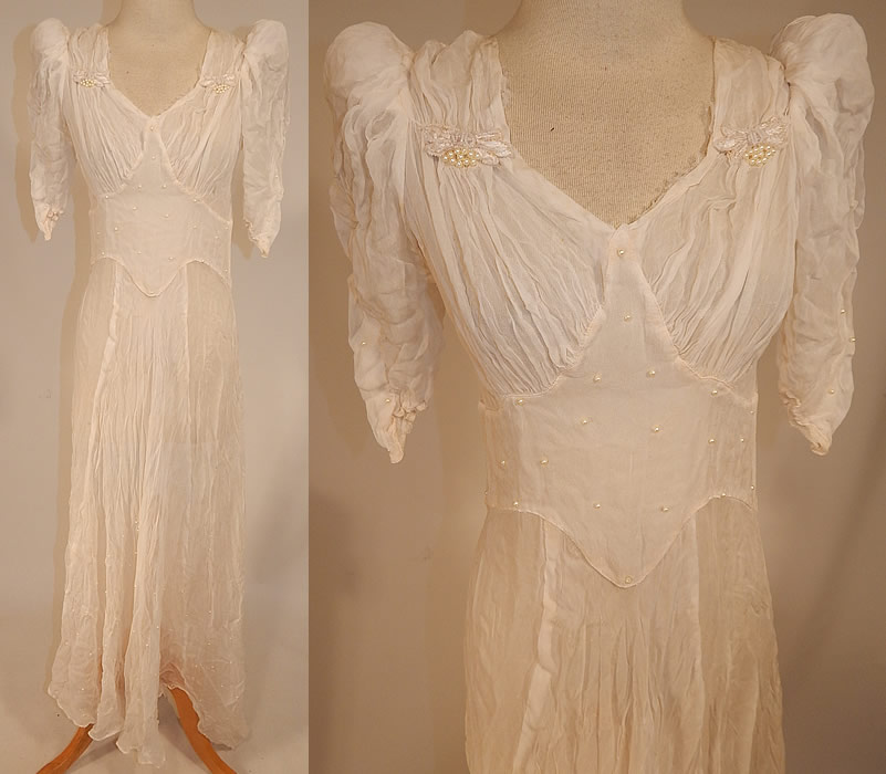 Vintage White Silk Crepe de Chine Pearl Beaded Wedding Gown Dress Long Train Skirt
 This vintage white silk crepe de chine pearl beaded wedding gown dress long train skirt dates from the 1940s. It is made of a white sheer silk crepe de chine fabric, with beaded pearls scattered throughout and white silk embroidered beaded appliqu&eacute; trim on the shoulders. 