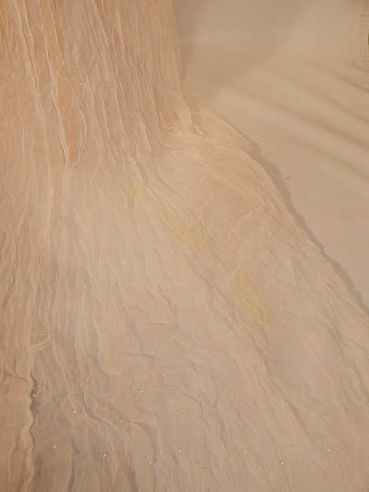 Vintage White Silk Crepe de Chine Pearl Beaded Wedding Gown Dress Long Train Skirt
 It is in good condition, but has not been cleaned, with faint underarm discoloration, 3 small yellow stains on the back train skirt and a few missing buttons (see close-ups). This is truly a wonderful piece of wearable WWII wedding bridal art!