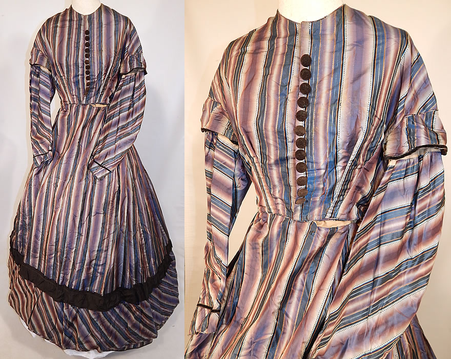 Victorian Civil War Era Purple & Blue Ombre Stripe Silk Hoop Skirt Gown Dress
This antique Victorian Civil War era purple and blue ombre stripe silk hoop skirt gown dress dates from the 1860s. It is made of a purple, blue and black ombre iridescent striped silk taffeta fabric.