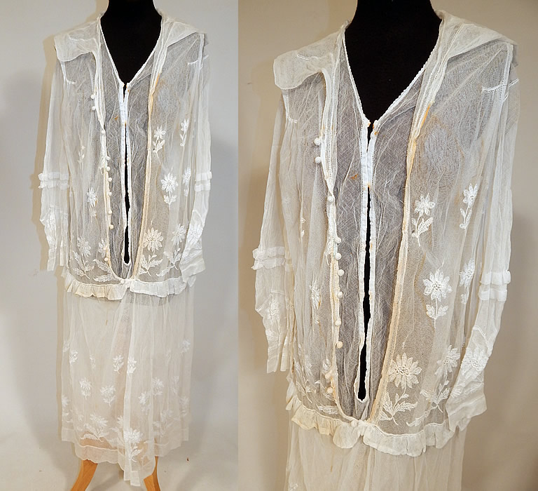 Vintage B. Altman & Co White Cotton Tulle Net Embroidered Lace Drop Waist Dress
This vintage B. Altman & Co. white cotton tulle net embroidered lace drop waist dress dates from the 1920s. It is made of a sheer white cotton tulle net fabric, with embroidered daisy flowers. 
