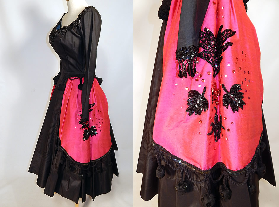 Vintage Black Pink Silk Sequin Beaded Dress Carmen Costume Tennessee Ernie Ford Show
It is made of a black silk moire watered taffeta fabric, with an iridescent hot pink silk fabric peplum apron overskirt, black braided rope, pompoms, sequin, jet beaded trim edging and accents. 