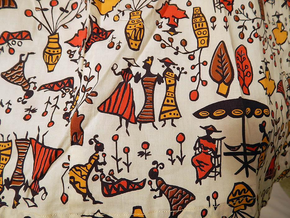 Vintage Cotton Caribbean African Women Novelty Print Circle Skirt Halter Dress Jacket
This retro summer sun dress has a halter top with brass studs, rhinestone beading around the neckline, a full circle skirt, matching fabric belt, buckle and back zipper closure.