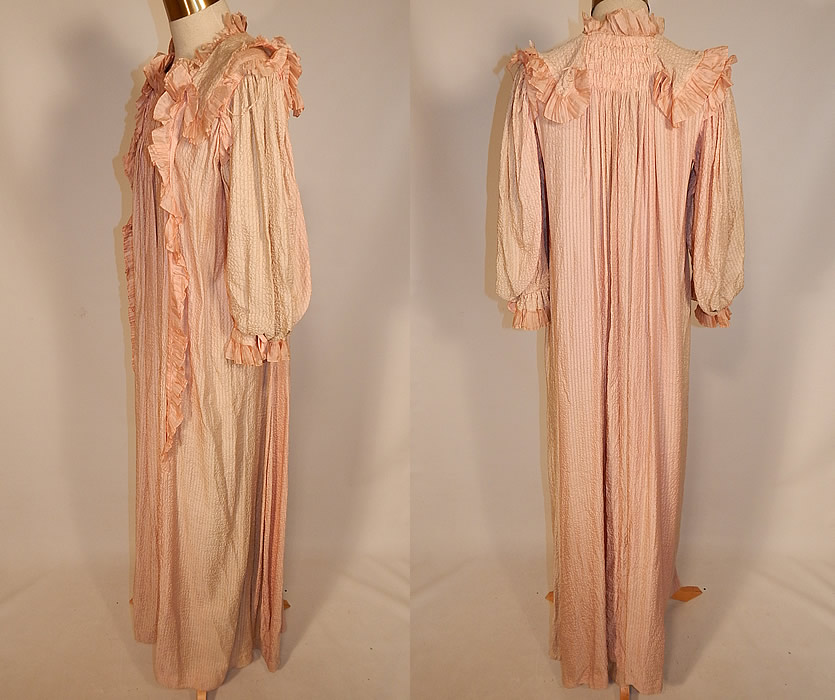 Victorian Pink Crinkle Crepe Silk Ruffle Morning Tea Gown Wrapper Robe Dress
This pretty pink morning tea gown wrapper robe dress has pleated pink silk ribbon ruffle trim edging, long full blousy sleeves with fitted ruffle cuffs, a neck ruffle trim neckline collar, hook closures on the front neck and is unlined. The gown measures 56 inches long, with 44 inch hips, a 44 inch waist, 36 inch bust and 17 inch long sleeves. 
