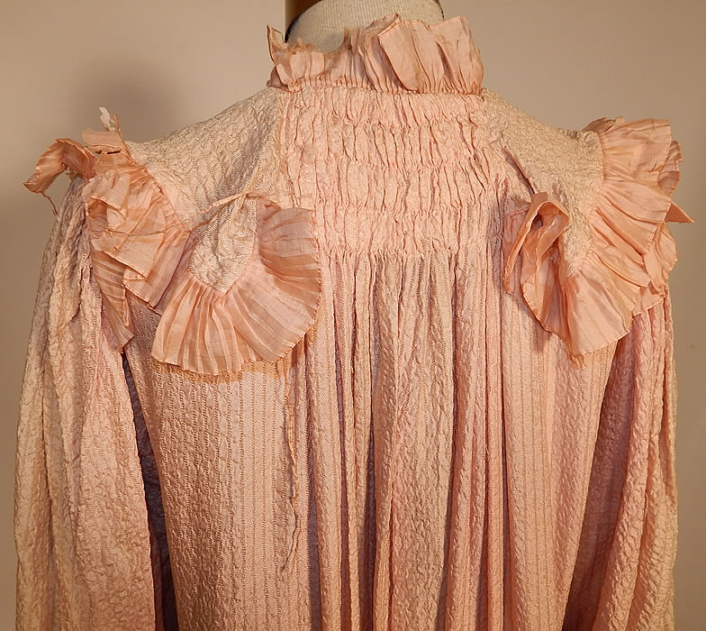Victorian Pink Crinkle Crepe Silk Ruffle Morning Tea Gown Wrapper Robe Dress
It is in fair as-is condition, has not been cleaned, with fade discoloration and fraying of the silk ribbon trim in areas (see close-up). This is truly a wonderful piece of Victoriana wearable art!
