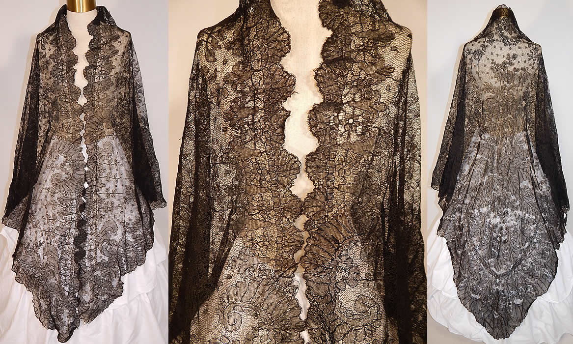 Victorian Civil War Era Antique Black Chantilly Lace Mantilla Shawl Pelerine
This antique Victorian Civil War era black chantilly lace mantilla shawl pelerine dates from the 1860s. It is hand made of a sheer fine black net French chantilly lace, with a lavish floral foliage leaf twig branch pattern outlined in black threads, with detailed shading effects, Swiss dots polka dot design and a beautiful decorative scalloped border edging. This lovely lace has been created into a large triangle shaped shawl style pelerine Spanish mantilla.