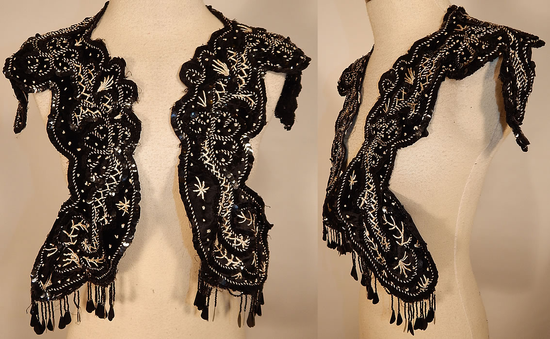 Edwardian Black Silk Velvet White Soutache Embroidery Dress Trim Collar
This Edwardian era antique black silk velvet white soutache embroidery dress trim collar dates from 1910. It is made of a black silk velvet fabric, with contrasting white French knot, soutache embroidery work stitching done in a decorative design and black beaded sequin fringe trim hanging down from the ends.