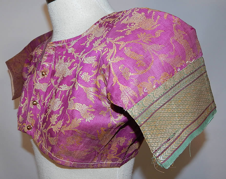 Vintage 19th Century Indian Purple Silk Sari Gold Lam&eacute; Lame Choli Crop Top Blouse
This vintage antique Indian purple silk sari gold lam&eacute; choli crop top blouse dates from the 19th century. 