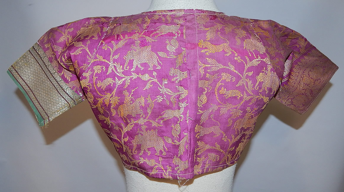 Vintage 19th Century Indian Purple Silk Sari Gold Lam&eacute; Lame Choli Crop Top Blouse
The top measures 10 inches long, with a 30 inch bust and 28 inch waist. 