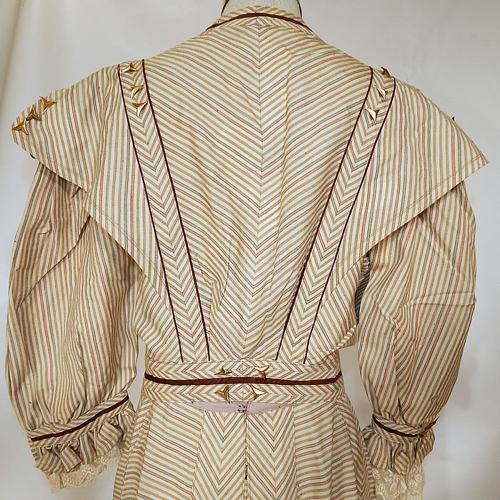 Victorian Brown & White Chevron Striped Wool Walking Suit Jacket Skirt
The skirt measures 41 inches long, with 44 inch hips and a 24 inch waist. It is in good as-is condition, with some tiny moth nip holes, reinforced patched repairs done inside and the original silk lining is shattered and has been removed. This is truly a wonderful piece of wearable antique Victoriana textile art!