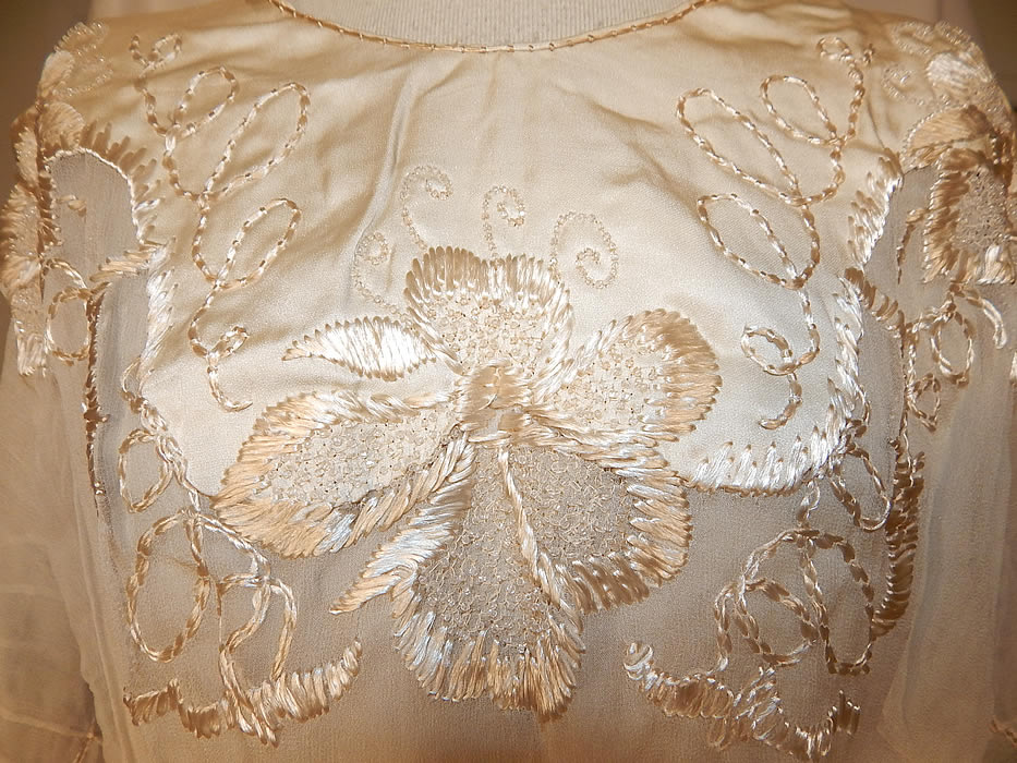 Edwardian Silk Embroidered Beaded Blue Ribbon Sash Belted Wedding Dress
This beautiful bridal wedding dress has a tea length skirt, with 3/4 length sheer sleeves, a wide blue silk ribbon sash belted bow side waist, inside hook, snap closures on the back and is lined only in the top. 