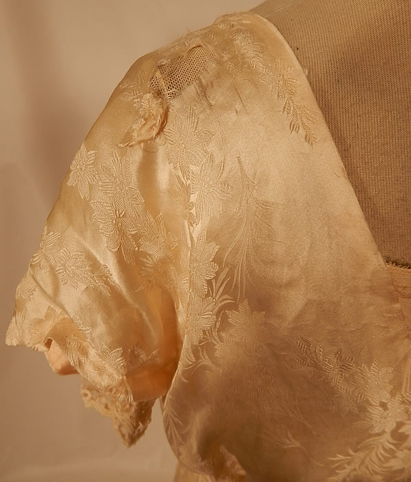 Edwardian Titanic Silk Damask Brocade Tambour Embroidery Lace Wedding Gown Dress
It is in good as-is condition, has not been cleaned, with some discoloration age spot staining on the lace front neckline and a frayed hole underarm and on the shoulder (see close-up). 