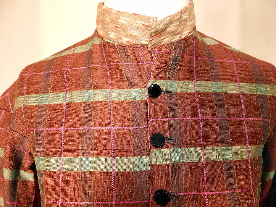 Victorian Civil War Brown Green Pink Plaid Stripe Wool Bodice Blouse Jacket Top
This short cropped bodice top has a cotton calico print band collar, long full sleeves with tapered cuffs, a fitted back, black faceted glass buttons for closure down the front and is fully lined in a brown cotton fabric inside.