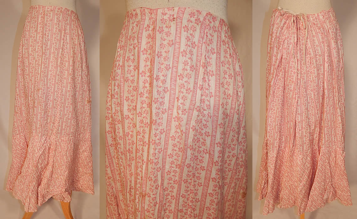 Victorian Red & White Stripe Cotton Calico Floral Print Petticoat Skirt
This antique Victorian era red and white stripe cotton calico floral print petticoat skirt dates from 1880. It is made of a white cotton batiste fabric, with a red striped floral calico print pattern design.