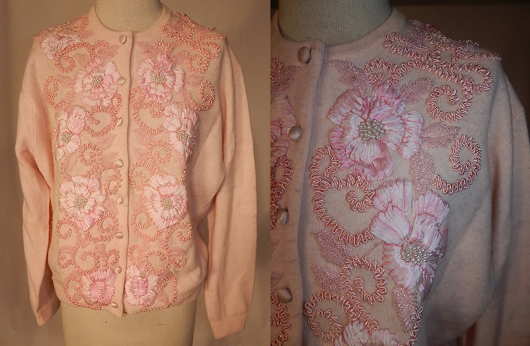 Vintage Oriental Galleries Hong Kong Pink Ribbon Work Beaded Sweater
This vintage Oriental Galleries Hong Kong pink ribbon work beaded sweater dates from the 1960s. It is made of a pink pastel lambswool, with ombre pink silk ribbon work flowers, pearl beaded stamen centers, pink beaded leaves and raised braided soutache trim vines. 