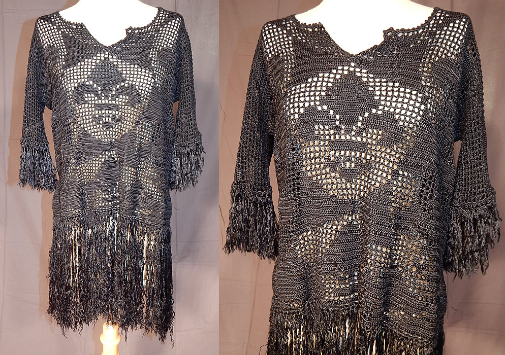 Vintage Black Macrame Crochet Fringe Fleur de lis Flapper Babydoll Dress Blouse Top
This vintage black macram&eacute; crochet fringe fleur de lis flapper babydoll dress blouse top dates from the 1920s. It is made of a black silk knit crochet macram&eacute; fabric with a fleur de lis decorative design. This fabulous flapper short babydoll dress, blouse tunic top has a loose fitting shift style, with a V front neckline, short sleeves, hand knotted black silk fringe around the cuffs and bottom skirt hem and is sheer, unlined.