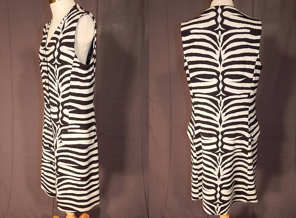 Vintage Kimberly Virgin Wool Knit Black & White Zebra Stripe Shift Dress
This sensational animal print mod dress has a loose fitting straight shift style, sleeveless, with a button down front closures, flap pockets on the hips and is unlined. 