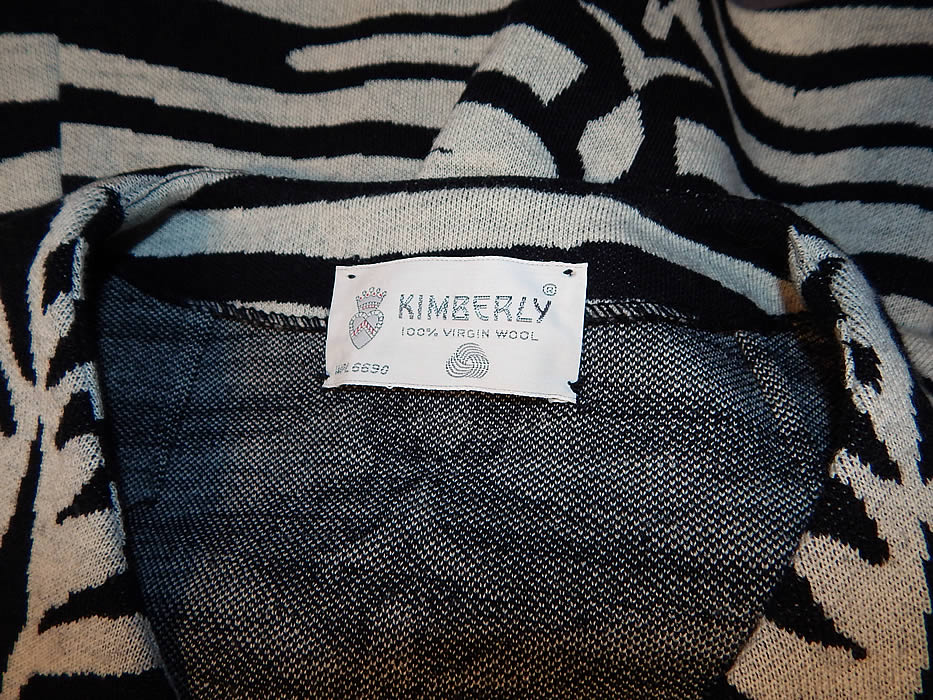 Vintage Kimberly Virgin Wool Knit Black & White Zebra Stripe Shift Dress
There is a "Kimberly" designer label sewn inside. The dress measures 36 inches long, with 36 inch hips, a 32 inch waist and 36 inch bust. It is in excellent condition, with only a tiny faint stain on the front top which is difficult to see. This is truly a wonderful piece of zebra striped print wearable art!