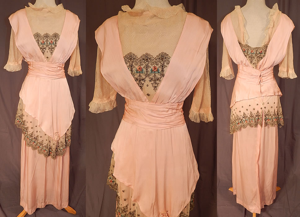Edwardian Titanic Era Pastel Pink Silk Silver Embroidered Lace Dress
This antique Edwardian Titanic era pastel pink silk silver embroidered lace dress dates from 1912. It is made of a pink pastel silk fabric, with an off white cream color sheer fine cobweb net lace insert and silver, gold metallic thread floral pastel embroidered trim.