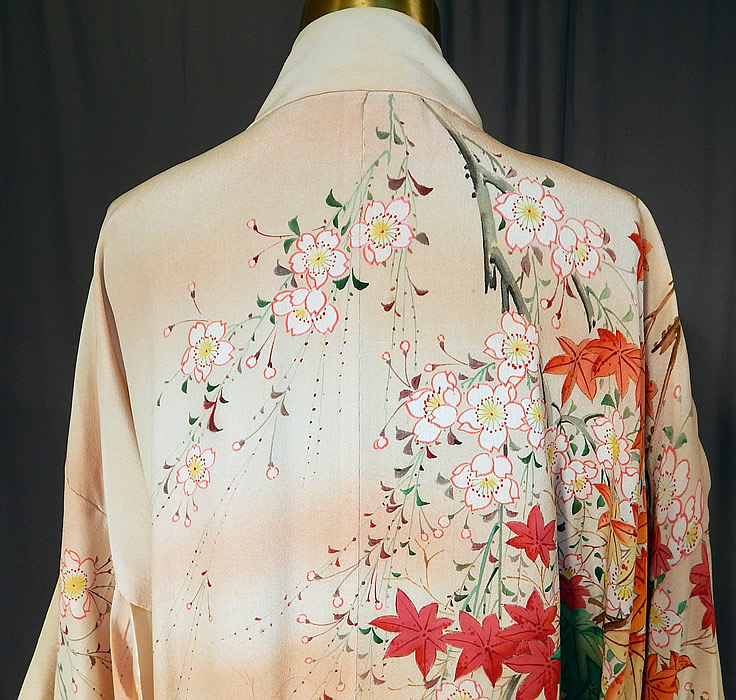 Vintage S. Nishimura Kyoto Japan Pink Silk Screen Cherry Blossom Japanese  Kimono
The kimono measures 56 inches long, with 31 inch long kimono sleeves, a 50 inch bust, waist and hips. It is in good condition, but has not been cleaned, with a some small faint stains on the front top and bottom skirt. This is truly a wonderful piece of wearable antique Japanese textile art!