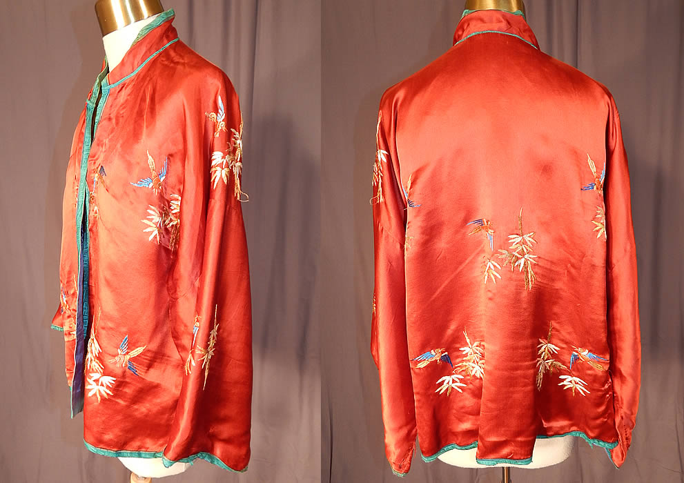 Vintage Chinese Cinnabar Red Silk Embroidered Bamboo Bird Robe Jacket
This short jacket style robe has a mandarin collar, with bluish green silk damask trim edging, an open front with no closure, long full sleeves and is fully lined in a blue silk fabric. The robe measures 22 inches long, with a 40 inch waist and 40 inch bust. 