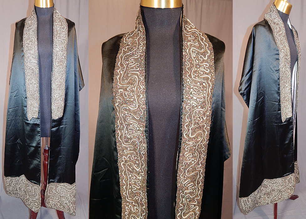 Vintage Art Deco Black Silk Gold Metallic Soutache Embroidery Stole Shawl
This amazing Art Deco vintage black silk gold metallic soutache embroidery stole shawl dates from the 1920s. It is made of a black silk satin fabric, with a colorful silk moire ribbon trim edging, gold metallic raised soutache embroidery work layered over it.