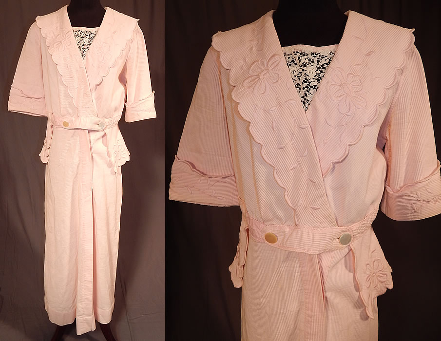 Edwardian Pink Cotton Pique Embroidered Peplum Dress Tea Gown
This vintage Titanic Edwardian era pink cotton pique embroidered peplum dress tea gown dates from 1912. It is made of a pale pink pastel color cotton pique textured twilled corded fabric, with pink raised padded satin stitch embroidery work flowers and decorative scalloped edging.