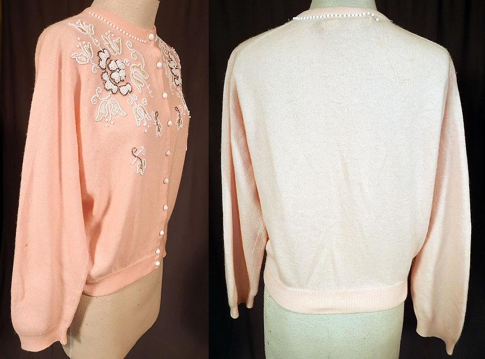 Vintage Pringle of Scotland Pink Cashmere White Beaded Cardigan Sweater
. It is made of a pale pink color soft 100% pure cashmere, with white hand beaded flowers accented with silver beads and cream silk embroidery work.