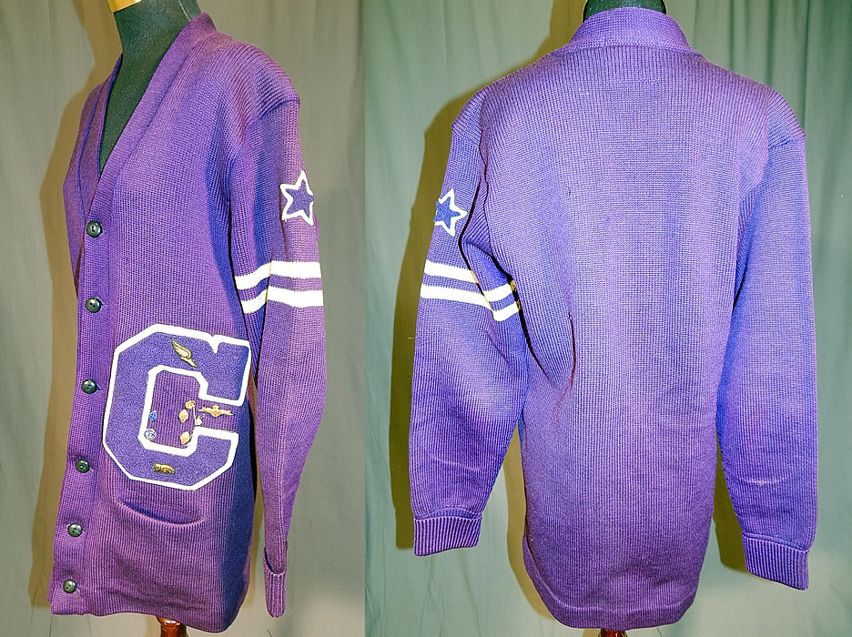 Vintage Albion Knitting Mills Award Sportswear Letterman School Sweater
This mens sportswear letterman school sweater has a cardigan button front closure style, with long sleeves, ribbed rolled cuffs, V neck, front pockets, two white stripes band woven around the arm, an embroidered wool purple patch star and letter C appliqu&eacute;.