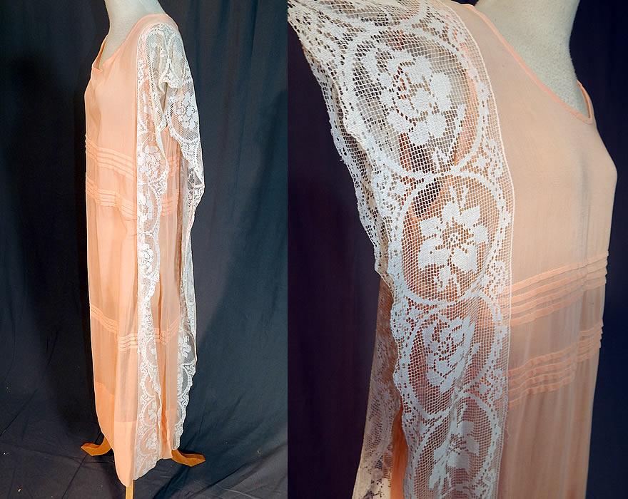 Vintage Pleated Peach Cotton Batiste Filet Lace Ruffle Trim Drop Waist Chemise Dress
This lovely lace loose fitting drop waist dress has a straight chemise style, sleeveless and is sheer, unlined. The dress is a large size measuring 46 inches long, with 42 inch hips, a 42 inch waist and 42 inch bust. 