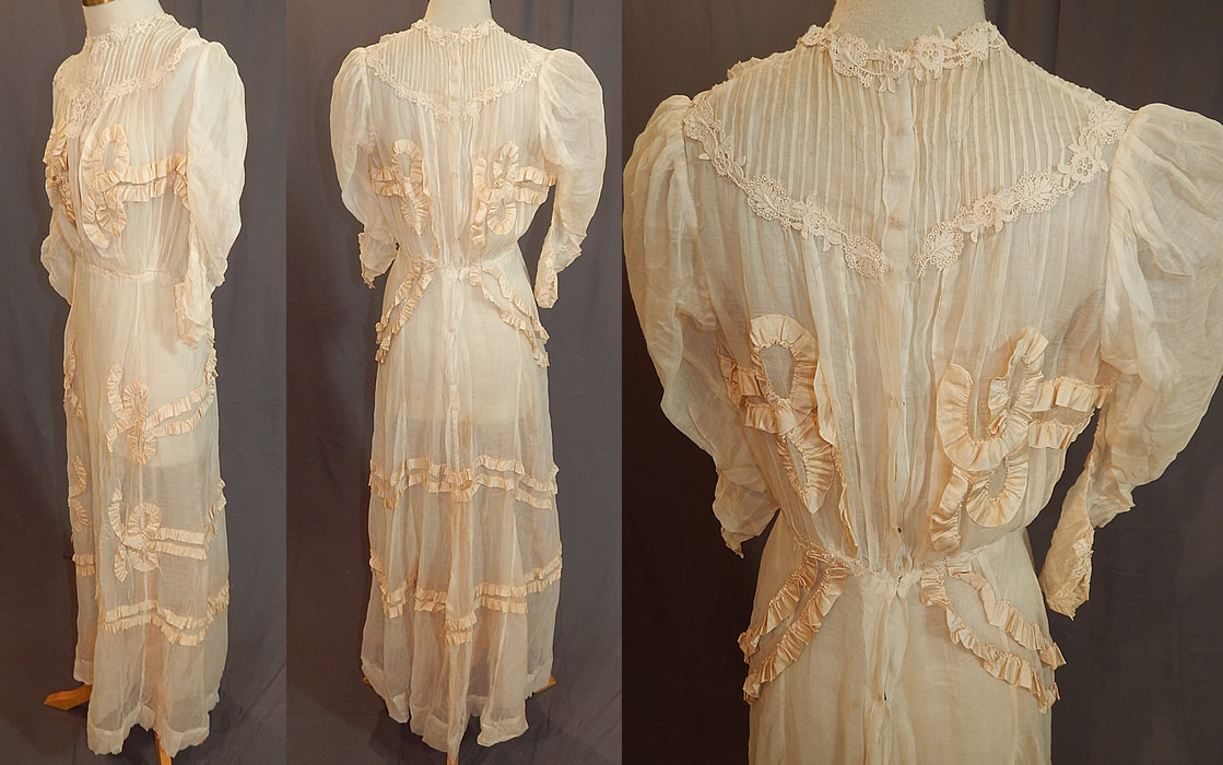 Edwardian White Cotton Muslin Lace Silk Ribbon Ruched Ruffle Trim Wedding Dress
The dress measures 53 inches long, with 36 inch hips, a 24 inch waist and 36 inch bust. 