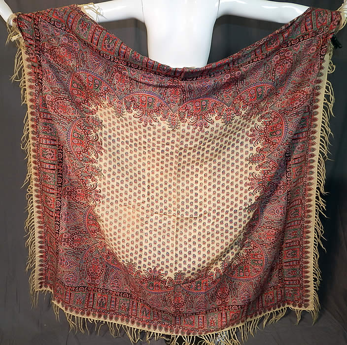 Victorian Antique Paisley Roller Print Wool Challis Fringed Shawl Scarf
There is a hand knotted cream wool fringe surrounding the entire shawl. These early shawls were made in Norwich, England and Paisley, Scotland with the fabric and designs taken from the shawls made in India and Kashmir. 