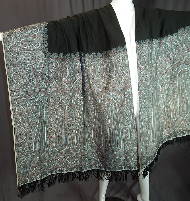 Victorian Antique Large Banquet Size Jacquard Loom Black & Blue Wool Paisley Shawl
These paisley shawls were made in Kashmir, Persia, India, Russia, USA and Europe in Scotland at Paisley itself. 