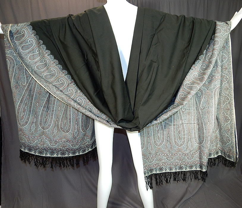 Victorian Antique Large Banquet Size Jacquard Loom Black & Blue Wool Paisley Shawl
This stunning shawl has wonderful workmanship and detail with a black fringed border on the two ends, white selvage along the side edgings and a large black wool center.