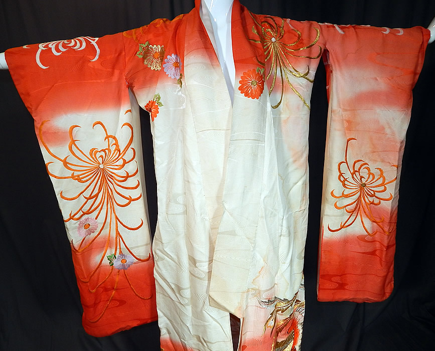 Vintage Japanese Peacock Red Silk Gold Embroidered Uchikake Wedding Kimono
It is made of a white watered moire silk and reddish orange ombre tie dye damask fabric, with a colorful silk and gold metallic thread raised padded satin stitch embroidered Japanese chrysanthemum flowers and peacock birds. 