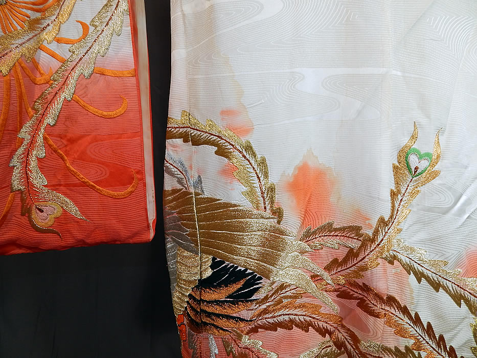 Vintage Japanese Peacock Red Silk Gold Embroidered Uchikake Wedding Kimono
. It is good as-is condition, with some loose stitching, open seams along the sleeve and several color bleeding, water spot stains both inside and outside (see close-ups). This is a truly a wonderful piece of wearable Japanese textile art! 