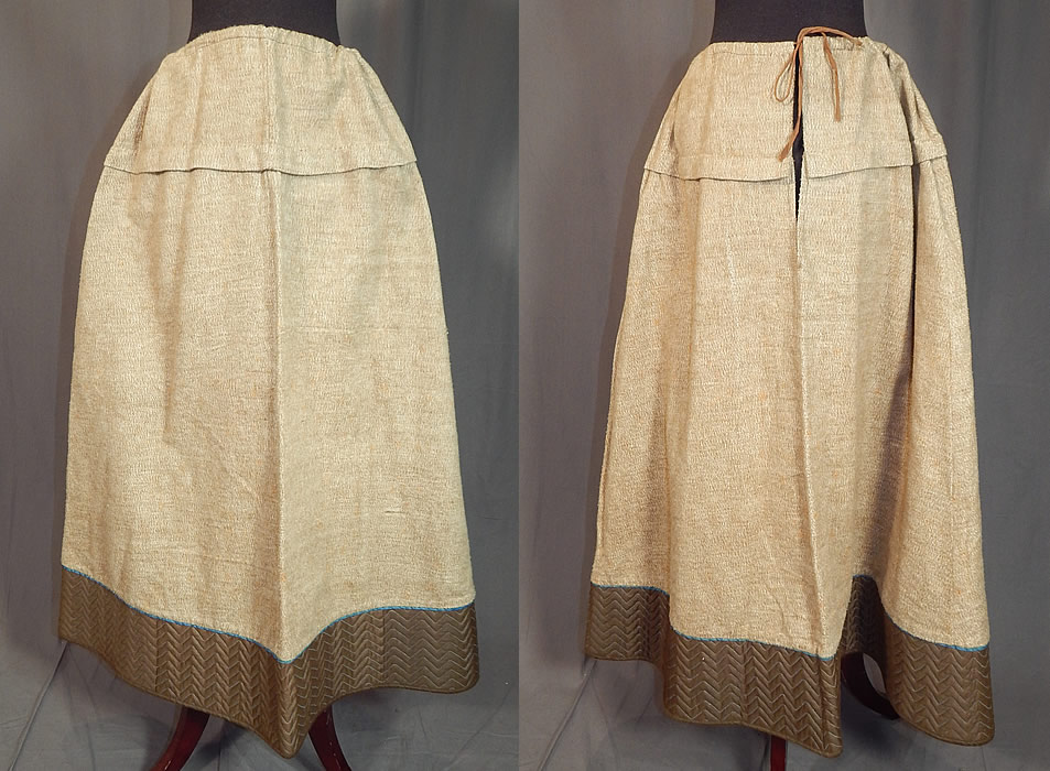 Victorian Brown Flannel Blue Stitched Quilted Trim Winter Petticoat Skirt
This antique Victorian era brown flannel blue stitched quilted trim winter petticoat skirt dates from 1890. It is made of a light brown tan oatmeal color soft brushed nap flannel cotton fabric, with a brown polished cotton, blue stitched quilted decorative chevron striped trim bottom hem.