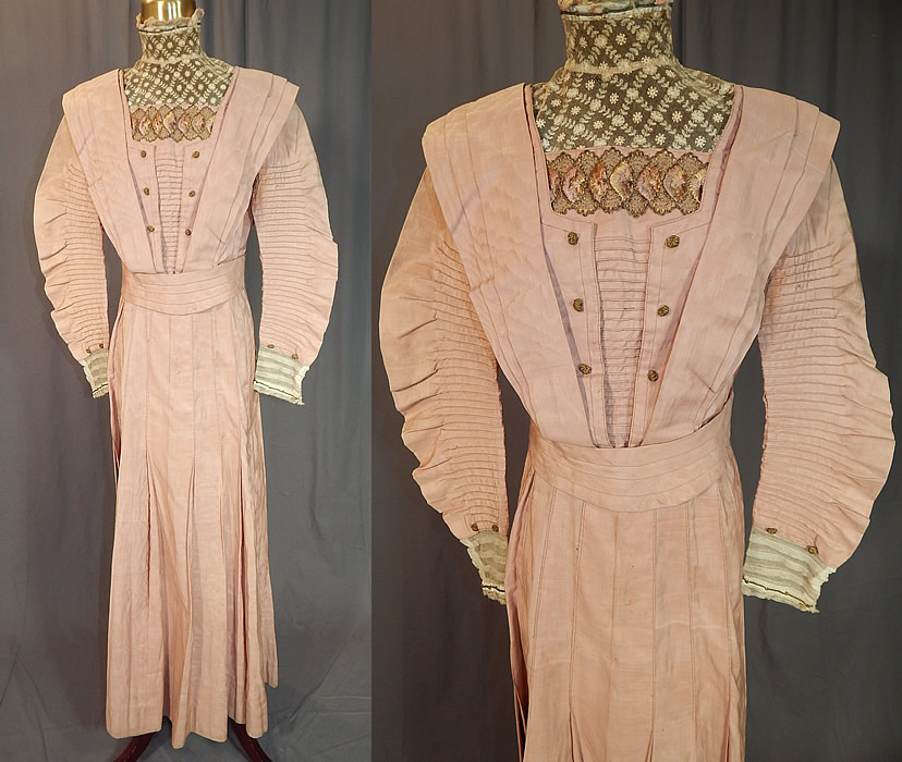Edwardian Pleated Pink Cotton Silk Moire Gold Embroidered Lace Collar Dress Gown
This antique Edwardian era pleated pink cotton silk moire gold embroidered lace collar dress gown dates from 1910. It is made of a pale pastel pink rose color cotton blend silk moire watered pattern fabric, with gold metallic knotted buttons, embroidered trim and an off white cream color net lace yoke high neck collar insert and cuffs. 