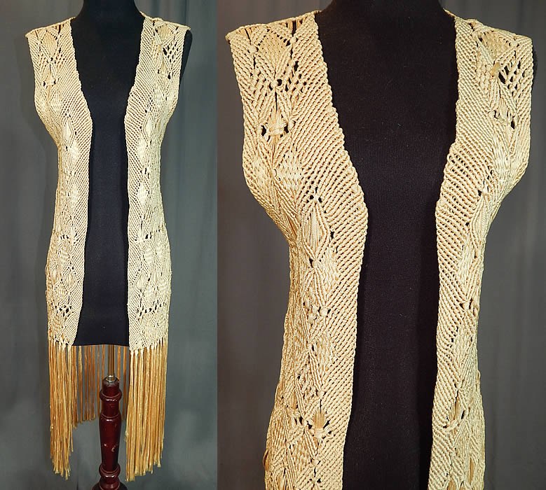 Vintage Yellow Boho Macrame Crochet Silk Ribbon Fringe Shawl Long Vest Jacket
This vintage yellow boho macram&eacute; crochet silk ribbon fringe shawl long vest jacket dates from the 1960s. It is made of a pastel yellow silk ribbon work fabric, with macram&eacute; crochet sheer woven decorative diamond designs.